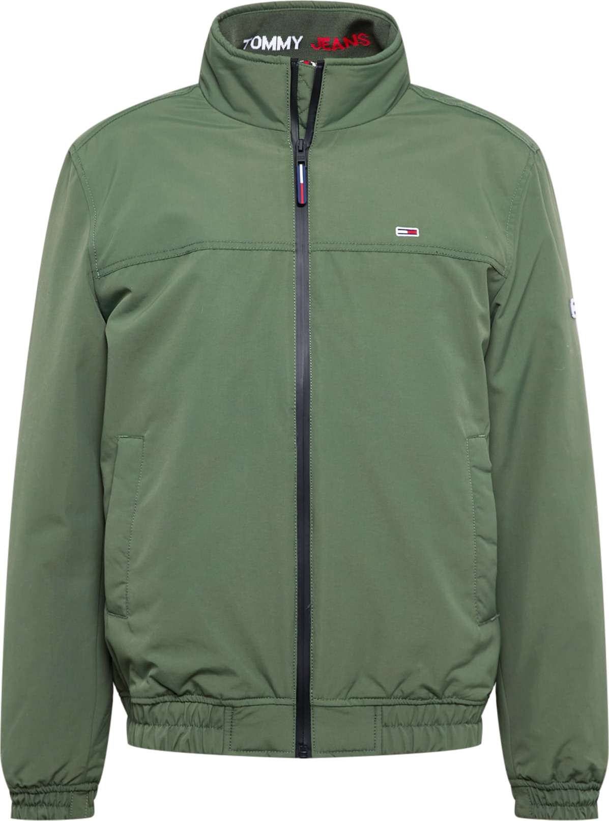 Tommy Jeans Přechodná bunda zelená / červená / bílá